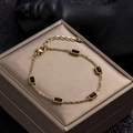 Gold-plated stainless steel bracelet with five rectangular black zircon stones - Black Zirconia