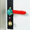 Close-up of Christmas door handle cover with plush tree and golden bell decoration - Christmas Tree With Bell