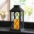 Retro black outdoor garden lantern with warm LED candle on a cozy fireplace mantle - Yellow Flashing Light / Black (Battery Model)