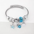 Marine style silver charm bracelet with blue crystals, starfish and swan pendants - C2-002 Blue
