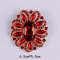 Elegant red crystal flower brooch pin with large oval stone in a vintage gold-toned finish - Gold Red Zirconia