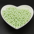 Mint green faux pearls in a white heart bowl for DIY jewelry making and crafts - Light Green