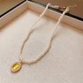 Elegante Perlenkette mit ovalem gelbem Kristallanhänger und goldener Fassung - Stil 17# Halskette-Grüner Katzenaugenstein Perle