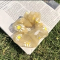 Sheer organza scrunchie with daisy floral pattern on vintage newspaper and grass background - Yellow Mesh Daisy