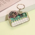 Mini piano keyboard keychain with clear transparent shell and functional white music keys - Bag Packaging / Clear White