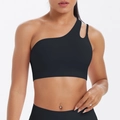 Close-up of black one-shoulder sports bra with asymmetrical cutout straps and high elasticity - S / Black