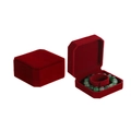 Macro view of a red velvet jewelry box for bracelets featuring an octagonal design - Burgundy