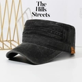 Vintage washed black flat top army cap with a brown leather patch and accent stitching - Adjustable / Black