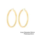 50mm gold hoop earrings for women with 4mm thickness and polished metallic finish - Inner Diameter: 50mm / Thickness: 4mm