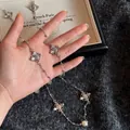 Dettaglio collana vintage argento con ciondoli a croce occhio di tigre e perle donna - Collana-Argento-Beige