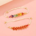 Detail of two handmade bohemian seed bead bracelets with adjustable cord knot closure - Multicolor Red (2 Pcs)