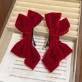 Pair of elegant red velvet bow hair clips displayed on a soft beige jewelry tray - Velvet Bow Hair Clips - Pair / Red