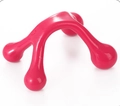 Detailed view of a pink manual handheld 4-wheel plastic roller massager tool - Four-legged Massager Red