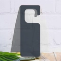 Single dark grey acrylic door handle tag on a white brick wall and wooden desk - Dark Gray (Transparent)