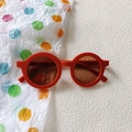Vibrant orange round-frame children's sunglasses with dark lenses for boys and girls - Sand Orange