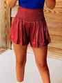 Detail of red metallic high waisted loose athletic shorts with shiny fabric texture - S / Bottoms / Red