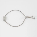 Pulsera de cadena box de acero inoxidable plateado con dije de letra 0 grabado y arenado - Letra O / Dorado