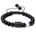 Libra zodiac beaded bracelet featuring black glossy beads and white opal accent stone - Libra