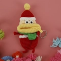 Handmade crochet key case featuring cute cartoon sausage mouth figure in red hat and green scarf - Red with Christmas Hat