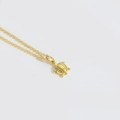 Elegante gouden ketting met een minimalistische schildpad hanger aan een fijne ketting - Schildpad