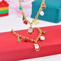 Christmas necklace and bracelet set with Santa, tree, and pearl charms on gold chain - Necklace + Bracelet