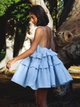 Light blue multi-layered ruffle mini dress with open back and thin straps in a forest setting - S / Dresses / Light Blue