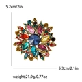 Vintage floral brooch with colorful rhinestones in a gold-finished alloy base - Colorful