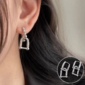 Elegant U-shaped silver hoop earrings with textured finish worn by a female model - Vintage Engraved Texture U-Chain Dangle Earrings(ED1981)