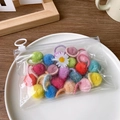 Colorful plush ball hair ties set in a transparent daisy pouch for kids and girls - Plush Candy Color