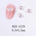 Macro detail of winged heart nail charms with pink pear-cut gemstones and alloy finish - Silver Base Pink Gem (A539)