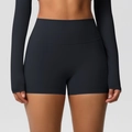 Detail view of high waisted seamless black yoga shorts with matte compression fabric texture - 7101 Shorts - Black / S