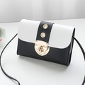 Chic black and white crossbody square bag featuring a golden heart lock and slim strap - Black