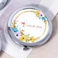 Round silver portable makeup mirror featuring I Love You floral print design - Red I Love You Text