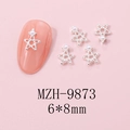 Macro view of star-shaped nail charms with hollow alloy design and inlaid pearls - MZH-9873 (6*8mm)