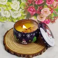 Christmas snowman scented candle in purple tin with dried red flowers and wood base - D220 Rose