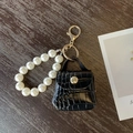 Mini borsa ciondolo nera motivo coccodrillo con cinturino in perle e ganci oro - Nero