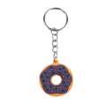 Portachiavi a forma di ciambella arancione con glassa viola e stelle su fondo bianco - Stile ttq-4
