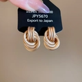 Close-up of matte gold twisted knot earrings on a 925 silver stud display card - Silver Needle - Multi-layer Twisted Knot / Gold