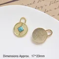 Detailed macro of golden Egyptian sun eye pendants with turquoise stone inlay and honeycomb texture - Style 3 Square Turquoise Pendant (17*23mm)