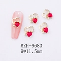 Macro detail of gold alloy heart nail charms with red zircon and Love letter design - Double Heart Love Letter Nail Art Charm (9683)