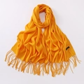 Solid yellow cashmere scarf with fringe details and woven material label - Orange