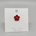 Cute red cherry blossom enamel pin with golden metal edges on a white display card - 119*Red Sakura Flower Pin