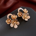 Golden flower earrings with hammered texture petals on a black hexagonal stand - Gold Flower Hammered Metal (32#)