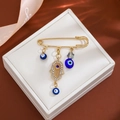 Gold Hamsa Hand and Evil Eye safety pin brooch with sparkling blue rhinestones - Rhinestone Hamsa Style (Z296)