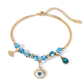 Bracelet en acier doré avec perles œil grec et pendentifs cil et pierre bleue - 31403-Style Pendentif Mauvais Œil