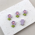 Macro detail of six purple resin flower and leaf charms for DIY hair clip accessories - 3# Purple Flower