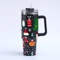 40oz stainless steel Christmas tumbler with penguin patterns, handle, and straw on white back - Black Penguin Christmas