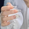 Lange ballerina kunstnagels in nude roze gradiënt met zilveren glitters, strass en 3D-strik - Gereedschapskiststijl / Vlinder in Droom (BY85)