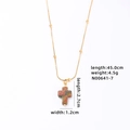 Kruis hanger van natuursteen aan een gouden slangenketting voor dames en heren - Veelkleurig Kruis