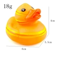 Detail view of small yellow striped rubber duck toy showing 6cm x 5.5cm size and 18g weight - Yellow Striped Duck
